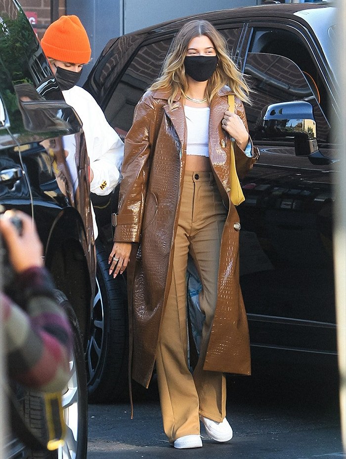 Hailey Bieber Saks Potts croc faux patent brown trench coat