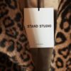 Stand Studio 64 svg%3E