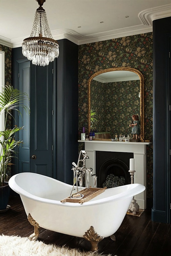 Gold and White Clawfoot Tub in Navy and Green Wallpapered Bathroom