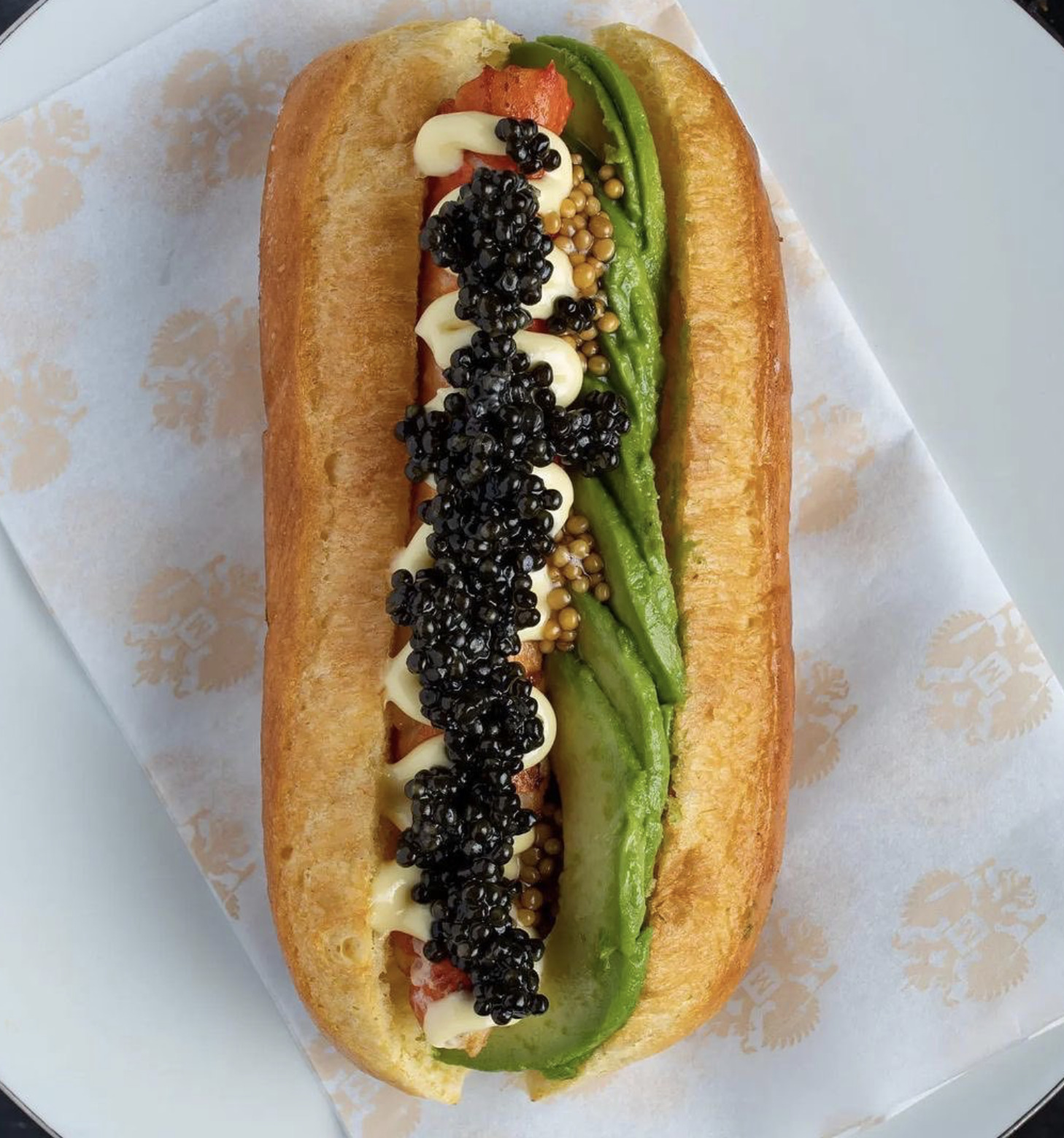 Huso Dog Alaskan King Crab Merus Brioche Avocado Mayonnaise Pickled Mustard Seeds Beluga di Venezia Caviar